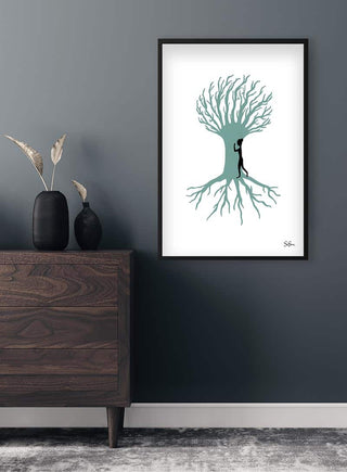 Framed "Roots" art print by Sara Sonne featuring a stylized tree with human figure, displayed above a modern dresser.