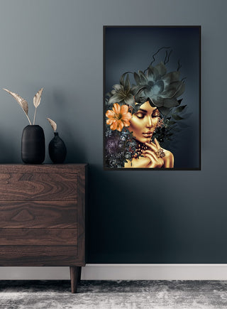 Golden Fashion 3 poster featuring a woman with gold makeup, flowers, and foliage, hung above a wooden dresser.