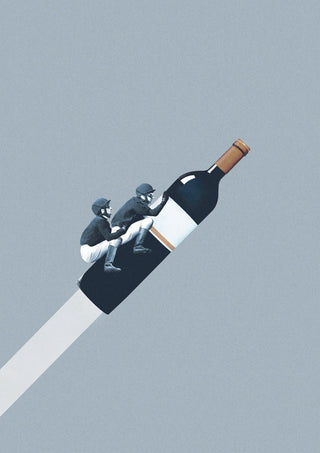 Two riders in jockey outfits ride a wine bottle like a horse against a plain background.