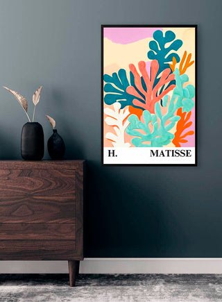 Framed Matisse Inspired Reef Corals Plakat displayed on a teal wall above a dark wood dresser.