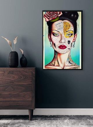 Colorful portrait of a woman with artistic face designs, displayed above a wooden dresser for Spirit Of Beauty - Tara Green.