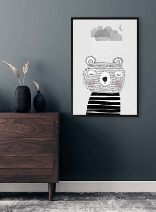 Framed "I Love Snow" bear illustration on a dark wall above a wooden dresser, with minimalist decor.