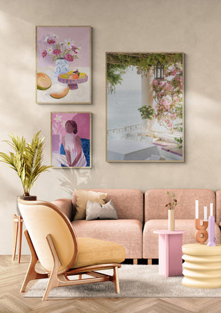 Modern Sorrento Vibes living room with pastel furniture, indoor plant, and floral wall art.