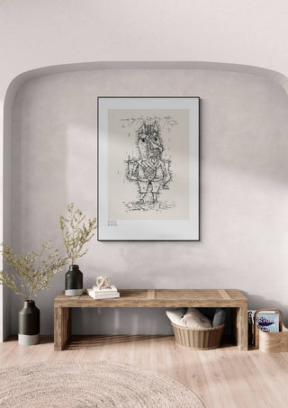 Framed "Hope and Destruction 1916" by Paul Klee displayed above a wooden bench in a modern interior.