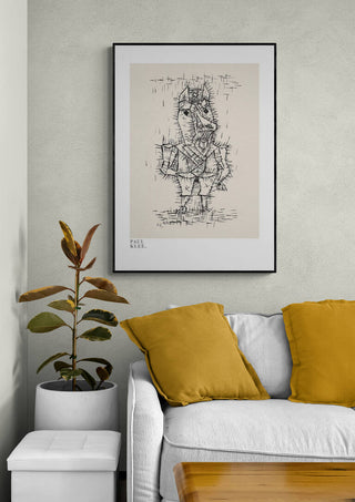 Framed print of Paul Klee's "Hope and Destruction 1916" displayed above a sofa with yellow pillows.
