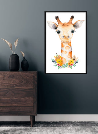 Cute giraffe poster with floral accents hanging on a dark wall above a modern wooden dresser in a child's room.