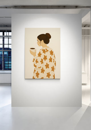 Minimalist artwork of a woman in a floral robe holding a cup, displayed on a gallery wall. Good Morning by Annika Persson.