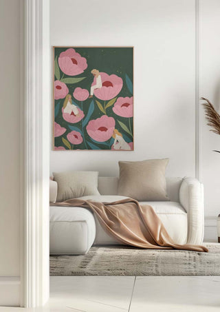 Habitat Bea Muller wall art featuring pink flowers and abstract figures above a modern white sofa in a bright living room.