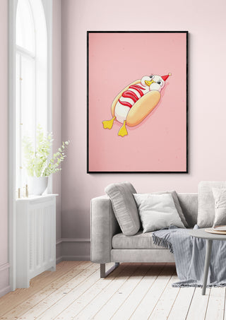 Framed Hot Duck - Nanna Paavig art print hanging above a light gray sofa in a modern living room.