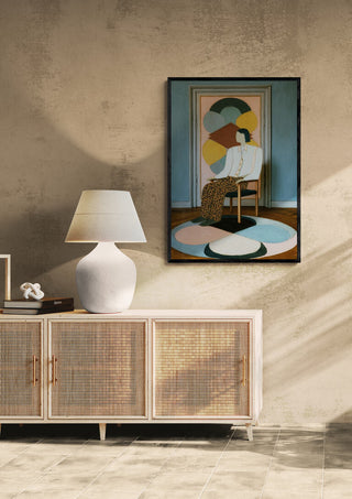 The Chair - David Wolf artwork hanging above a sideboard with a lamp in a modern, neutral-toned room.