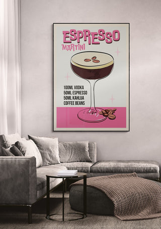 Espresso Martini wallchart with illustrated cocktail and recipe hangs above a modern gray sofa in a living room.