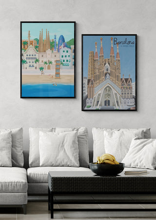 Two framed illustrations of Sagrada Familia and Barcelona landmarks hang above a modern sofa in a living room.