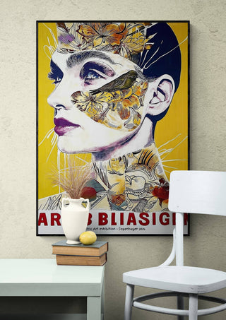 Colorful "It Ain't Cooking" artwork by Tara Green featuring a woman's face, displayed on a modern wall.